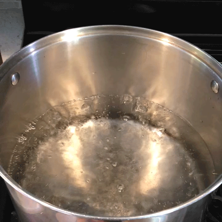 When the water in a pot on the stove is boiling rapidly, less water vapor is visible. When the water cools slightly, more vapor is visible. 