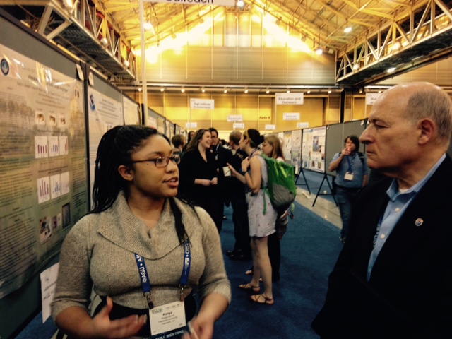 EPP/MSI USP Class of 2015 Scholar Kenya Bynes explains stock assessments to Dr. Spinrad, the NOAA Chief Scientist.

