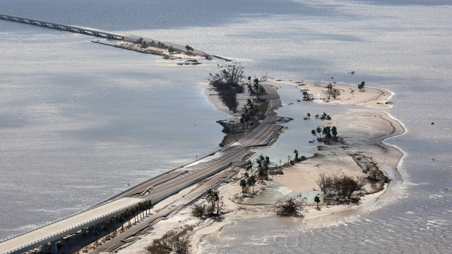  In this aerial view, parts of Sanibel Causeway are washed away along with sections of the bridge after Hurricane Ian passed through the area on September 29, 2022 in Sanibel, Florida. The hurricane brought high winds, storm surge and rain to the area causing severe damage.