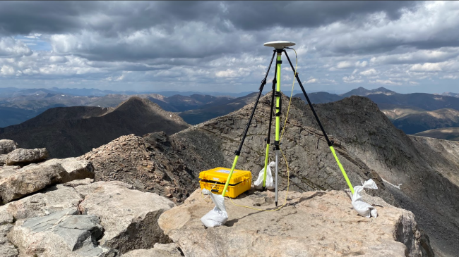 August 23, 2023: A GPS antenna and receiver determine an accurate position and elevation for a geodetic control mark on the top of Mt. Blue Sky, Colorado, elevation 14,266 feet.