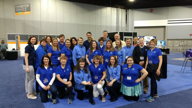 NOAA staff and partners assemble at the NOAA Booth before the 2018 National Science Teachers Association conference. 