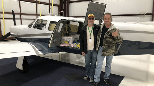Pilot Ed Filangeri and Co-Pilot Chris Wernau prepare to fly turtles from Massachusetts to North Carolina.