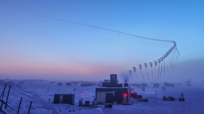 This time-lapse photo shows the path of an ozonesonde as it rises into the atmosphere in the South Pole. Scientists release these balloon-borne sensors to measure the thickness of the ozone layer. Courtesy of Robert Schwarz/University of Minnesota
