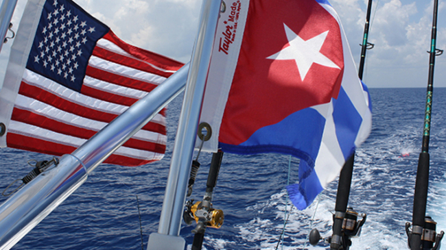 The national flags of the United States of America and Cuba fly side by side during the Hemingway Fishing Tournament. 