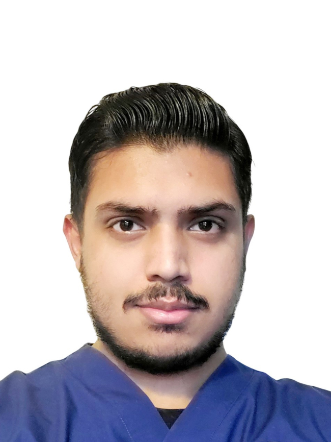 A headshot of Hassan Shaikh.