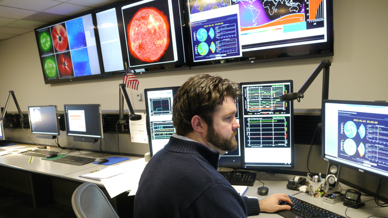 Dave Marshall monitors space weather in NOAA’s Space Weather Forecast Office.