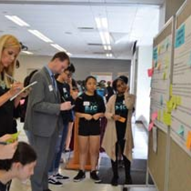 Participants provide feedback on students' resilience plans at the Resilient Schools Consortium's 2nd Student Summit at Brooklyn College.