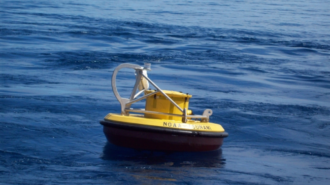 Photo showing NOAA DART buoy floating in the water. 