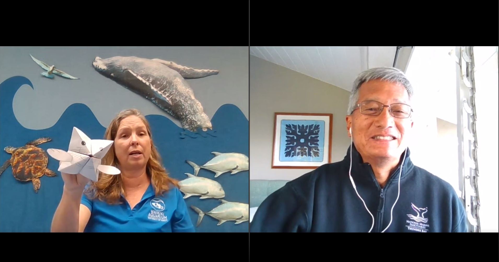A screenshot of a webinar showing two people in separate videos. In one, Mary Roney holds up what looks like a seal puppet made out of folded paper. In a separate video feed, Tom Allen smiles. 