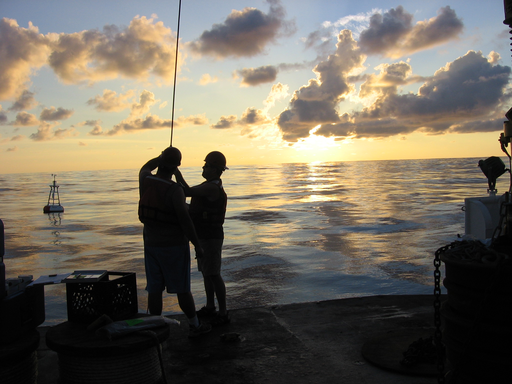 At sunset, buoy technicians put on the final touches — the underwater sensors. After deploying the buoy, they attach 11 sensors to the wire that will hang 500 meters underwater from the hull to collect data on salinity, currents and subsurface temperatures. The mast has 4-7 weather sensors. Weather buoys ensure more accurate and timely forecasts of extreme weather events. 
