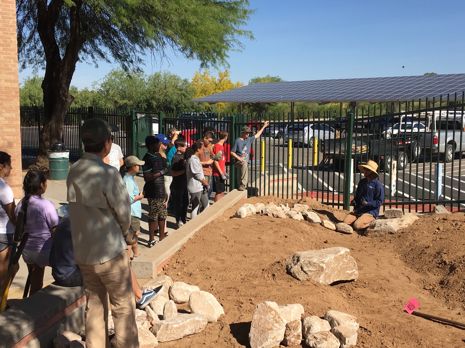 On a warm morning in May 2019, a group of volunteers gathered at Canyon del Oro High School to install a rainwater garden. This is one example of 8 similar projects at Tucson-area schools where students have developed rainwater garden plans, with assistance from staff from Arizona Project WET and Watershed Management Group.