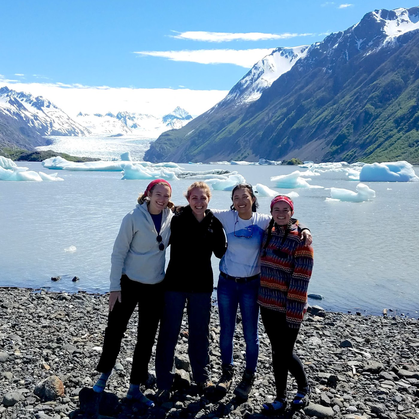 NOAA Scholars (left to right) Adrian Teegarden, Anna Lowien, Ashley Bang and Megan Hazlett are all doing research projects related to the life cycles and habitats of salmon and forage fish in the Kenai Peninsula of Alaska. As you can see, they've been out conducting field work in some of Alaska's most beautiful bays!