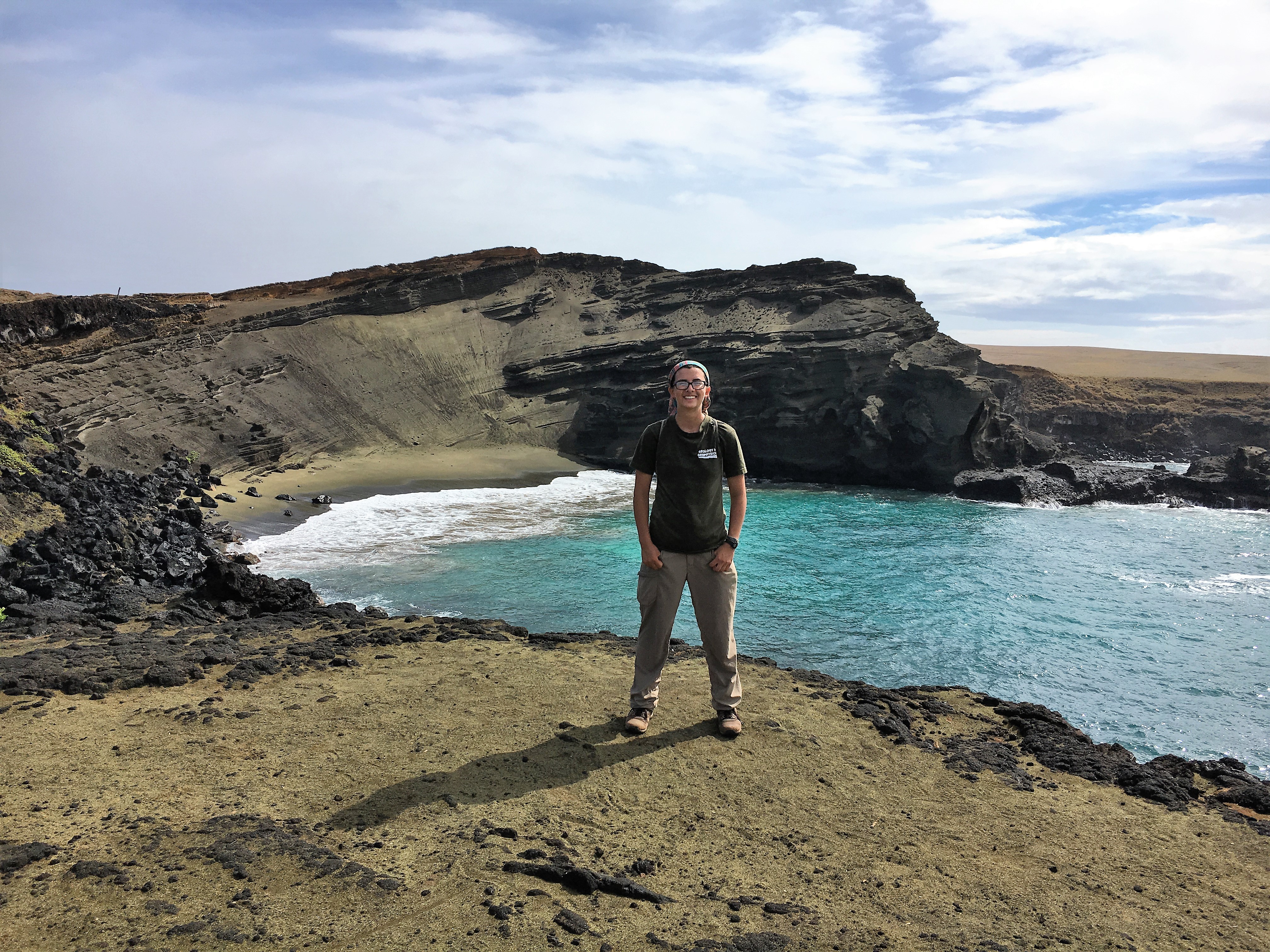 Jin-Si Over, 2015 Hollings Scholar alum, stands at one of her favorite beaches in Hawaii - the green sand beach at Papakolea. Her internship in Summer 2016 focused on shoreline change in Hawaii.