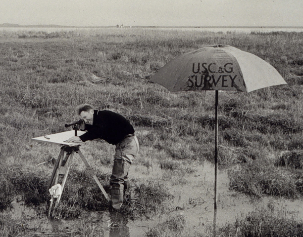 Until the 1990s, an alidade, or telescope-like instrument, was used along with a plane table to manually map features such as those in this coastal marsh. Sensors on drones now do this work efficiently, cost-effectively and with greater precision.  