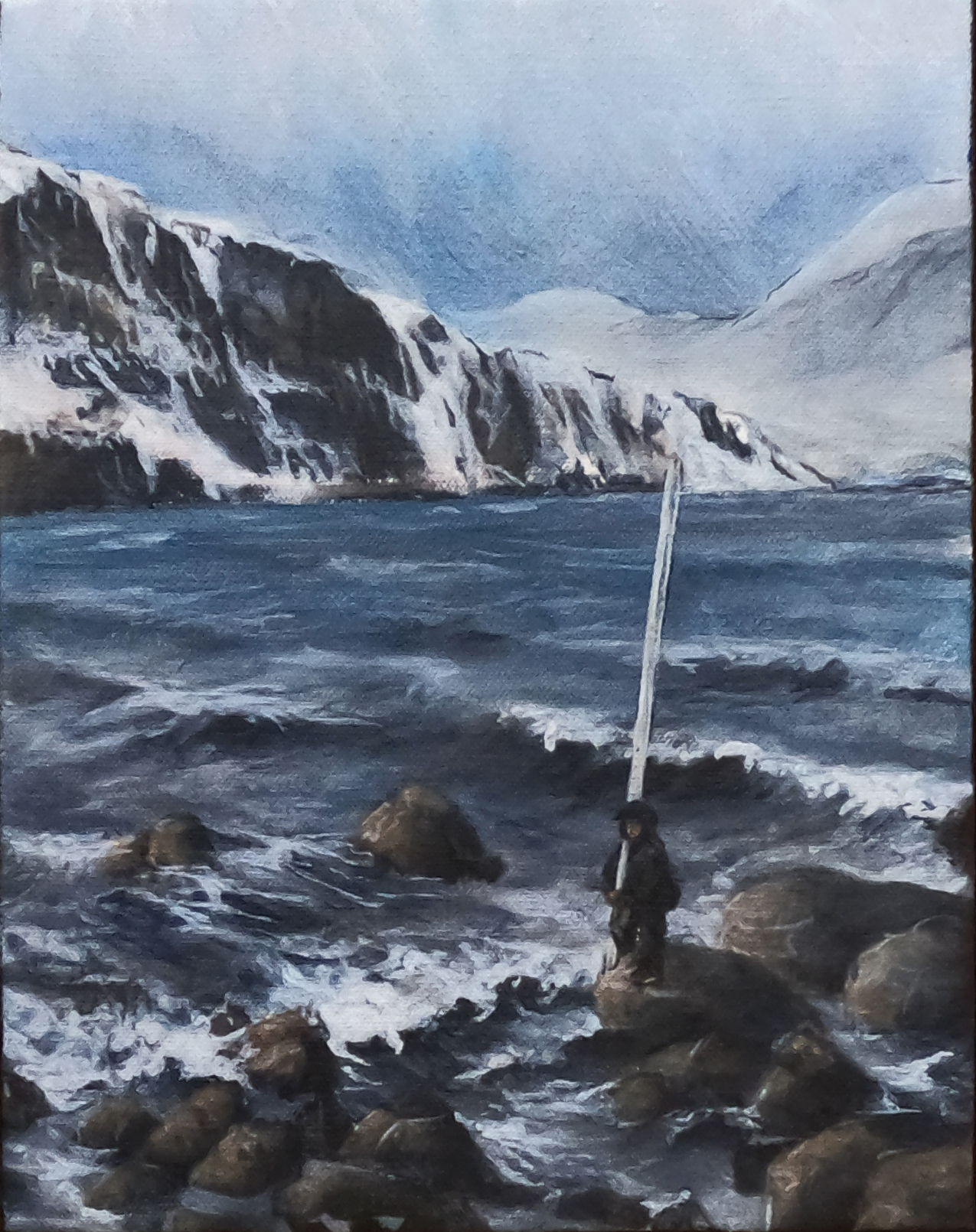 The painting shows a person in a rain slicker holding a staff over twice their height and standing on coastal rocks that are surrounded by choppy water. In the background of the painting is a landscape of snowy mountains and an overcast sky. 
