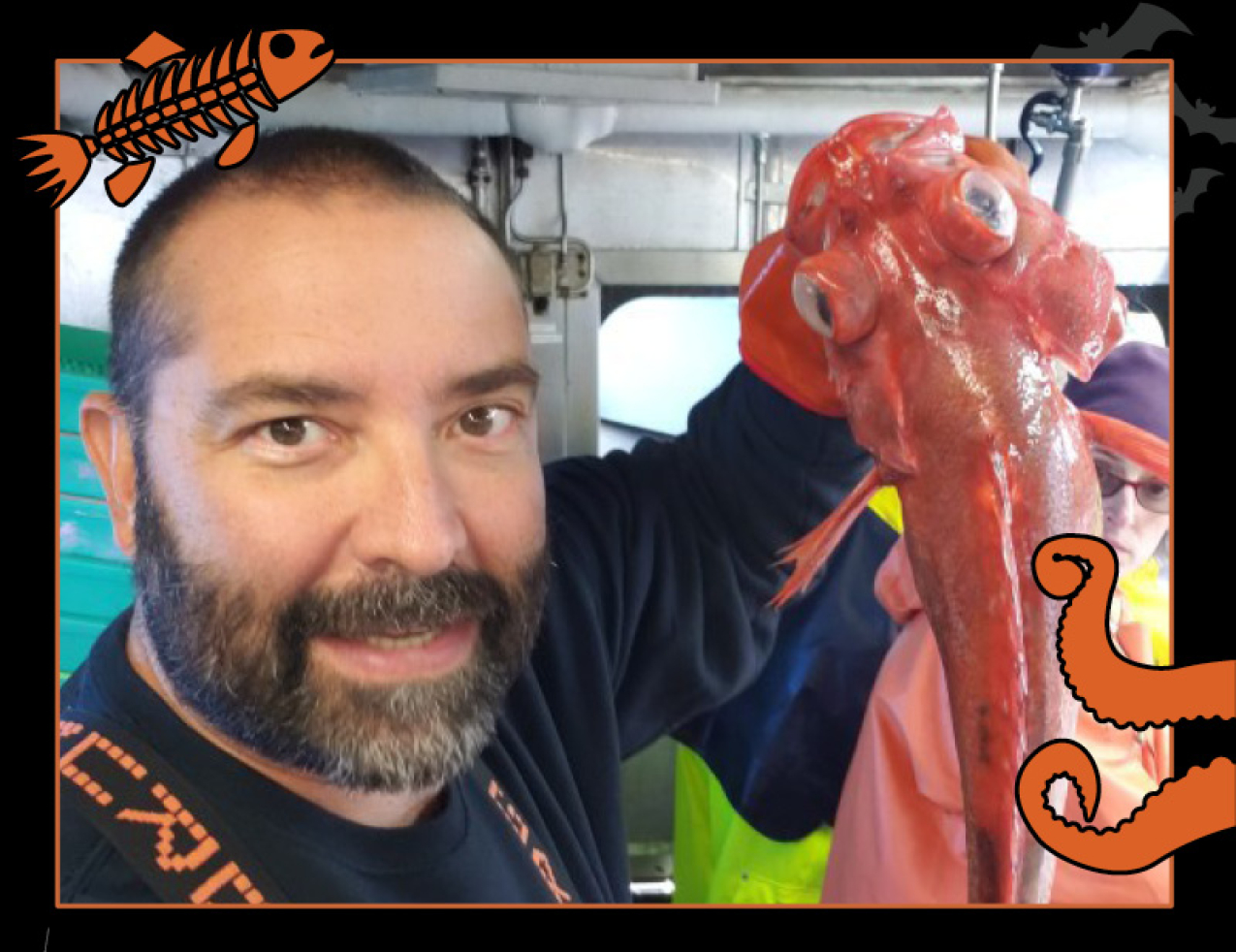 Phil Moorhouse holds up a red Vermilion rockfish with bulging white eyes. Border of the photo is black with orange sea creature graphics of octopus tentacles and a fish skeleton. Text: Look what the net dragged in #NOAASpookyScience with NOAA logo.