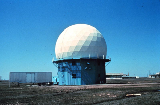 NSSL's first Doppler Weather Radar located in Norman, Oklahoma.1970s research using this radar led to the NWS NEXRAD WSR-88D radar network.