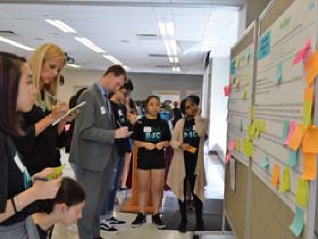 Participants provide feedback on students' resilience plans at the Resilient Schools Consortium's 2nd Student Summit at Brooklyn College.