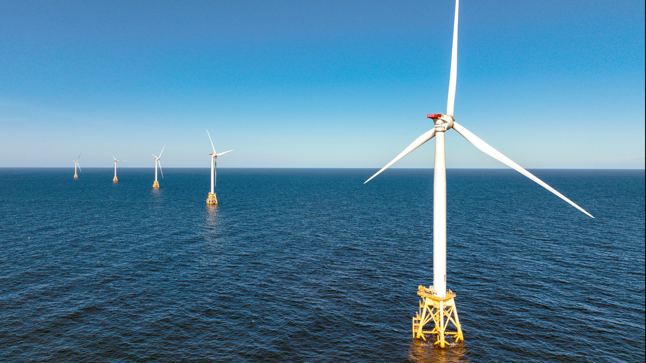 Aerial view of wind turbines that generate electricity at the Block Island Wind Farm on July 07, 2022 near Block Island, Rhode Island. The first commercial offshore wind farm in the United States is located 3.8 miles from Block Island, Rhode Island in the Atlantic Ocean.