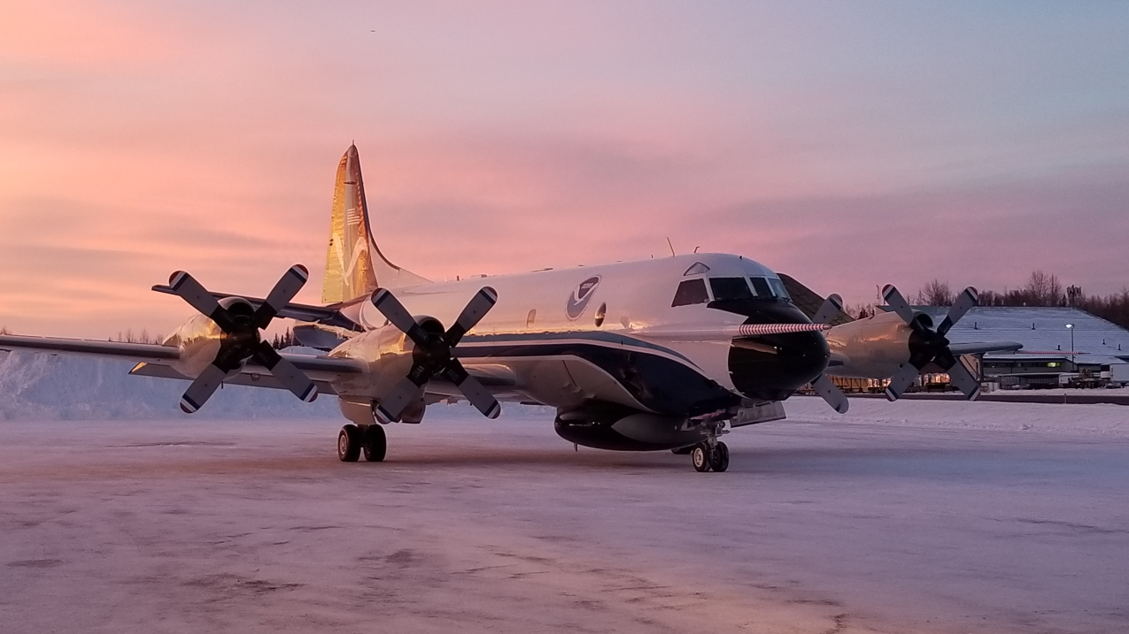 NOAA's WP-3D Orion pictured at Ted Stevens International Airport in Anchorage, AK, during the Ocean Winds Winter research project. 