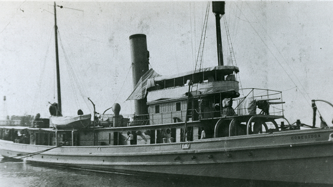 USS Conestoga (AT 54), the last known broadside photograph taken likely during WWI when the tugboat was equipped with a 3-inch 50 caliber naval gun and two machine guns. The tugboat was later equipped with only a single 3-inch 50 caliber gun when it disappeared while en route from Mare Island to America Samoa, by way of Pearl Harbor in 1921. 