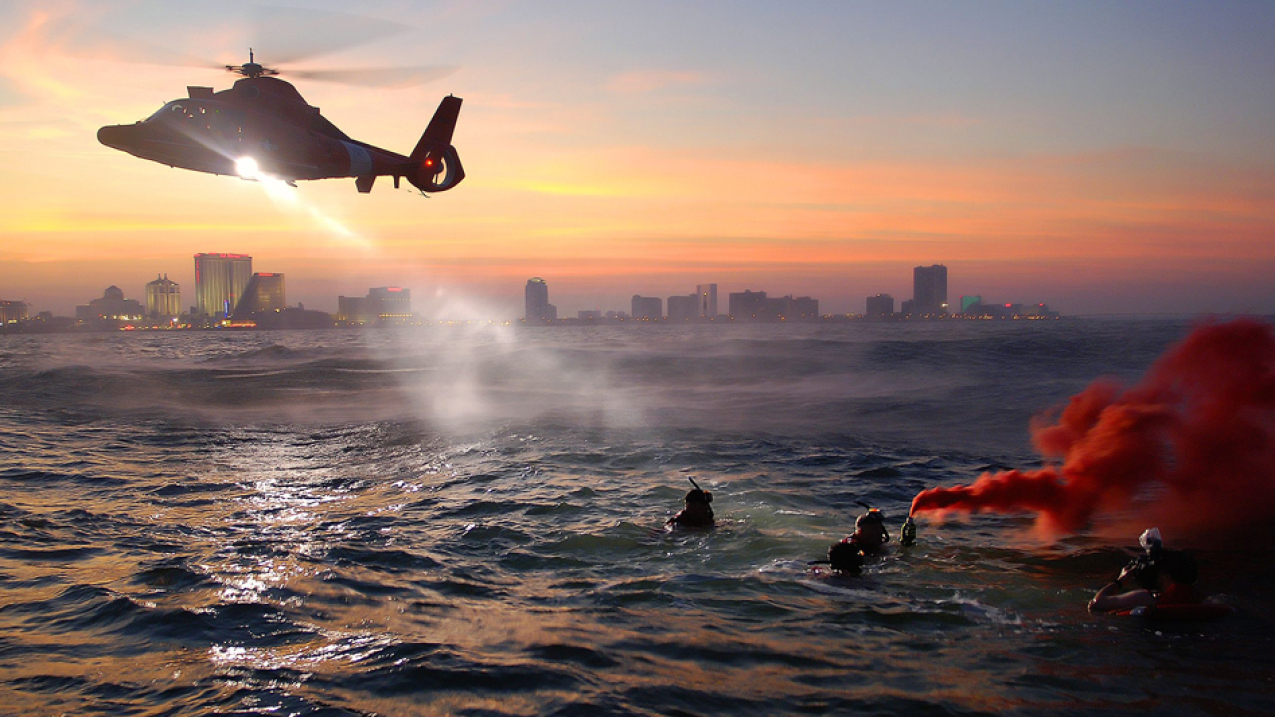 U.S. Coast Guard rescue swimmers from Coast Guard Air Station Atlantic City train off of the coast Atlantic City, New Jersey, during a U.S. Coast Guard Training Exercise.