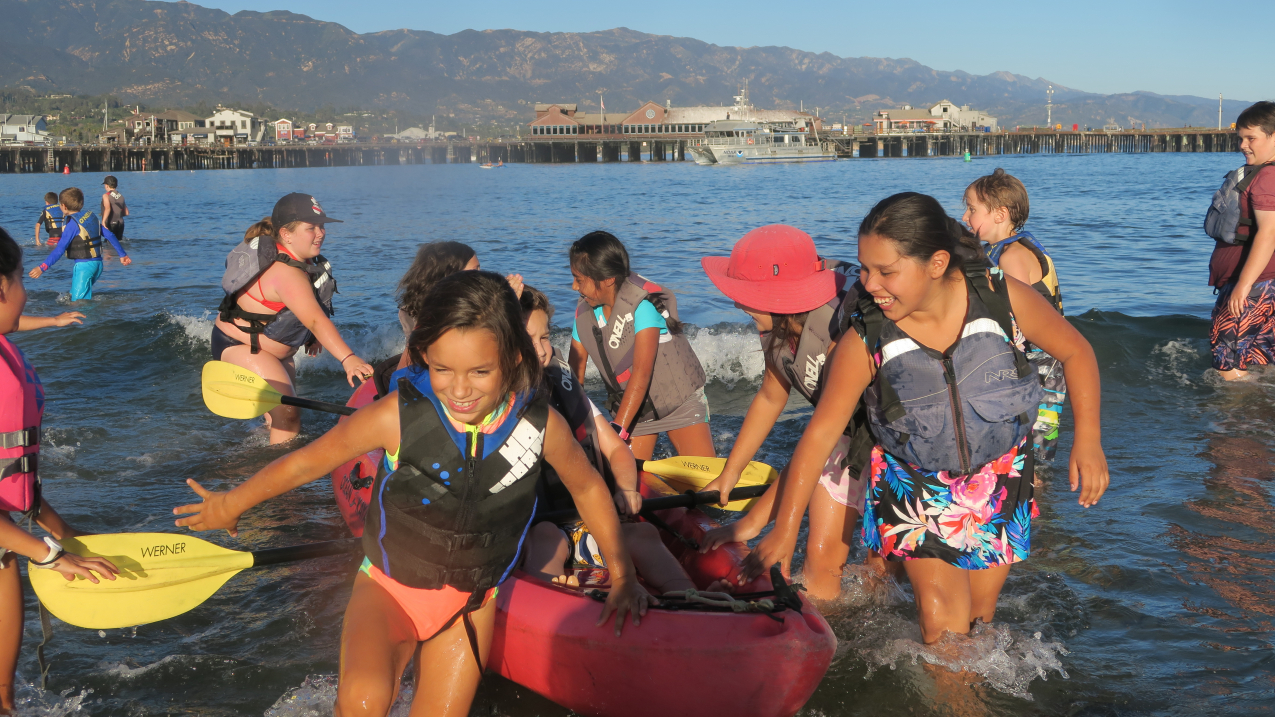 Elementary school students from an Ocean Guardian School in Santa Barbara, California, participate in a kayaking adventure.