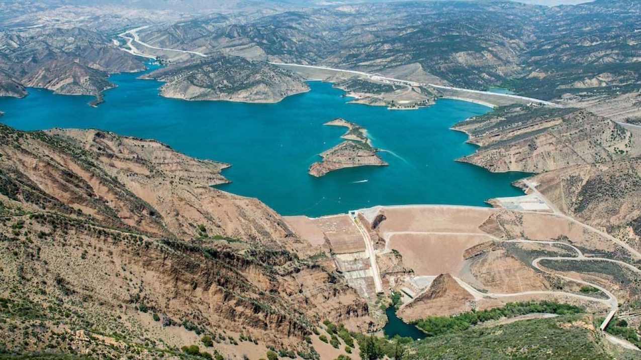 Pyramid Lake is a reservoir near Castaic, California. It stores water for delivery to Los Angeles and other coastal cities of Southern California. It also provides regulated storage for Castaic Powerplant and flood protection along Piru Creek which it dams.
