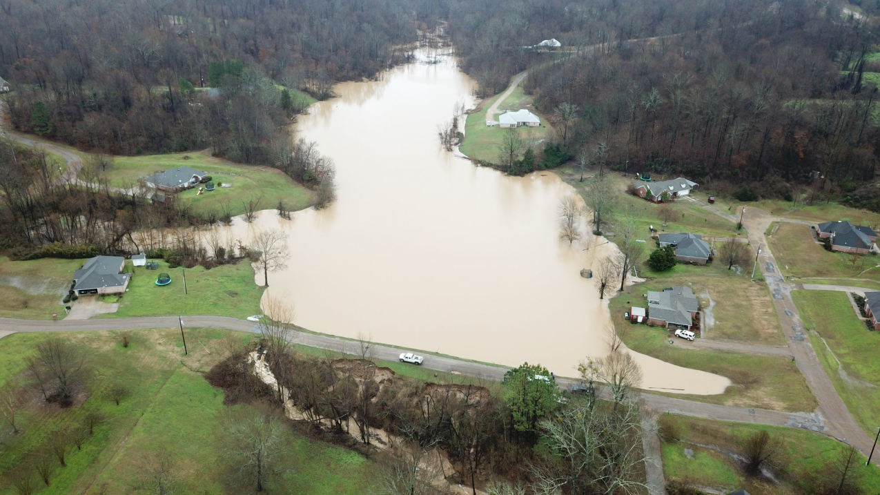 February 11, 2020 -- An aerial photo of a levee failure that flooded the Springridge Place Subdivision in Yazoo County, Mississippi, following heavy rainfall. Four homes and a church were threatened.  
