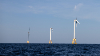 Photo showing a wind turbine generates electricity at the Block Island Wind Farm on July 07, 2022 near Block Island, Rhode Island.