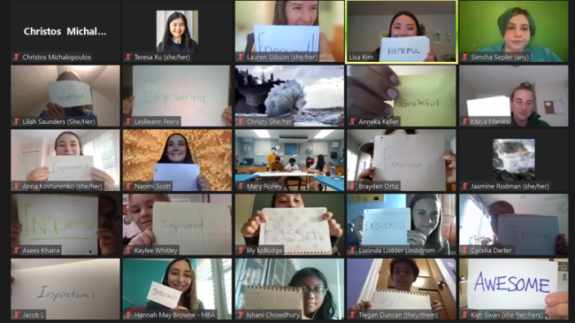Screenshot of teens and NOAA staff in a video meeting holding up pieces of paper with words written on them. Words include energized, hopeful, empowering, enlightened, grateful, inspired, inspirational, and awesome.