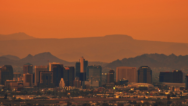 Climate change is contributing to more and longer heat waves in communities across the country, including western cities like Phoenix, pictured here. 