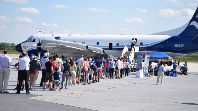 Photo showing families and students lining up to tour NOAA’s P-3 Hurricane Hunter aircraft during the 2019 Hurricane Awareness, Harrisburg, Pennsylvania.
