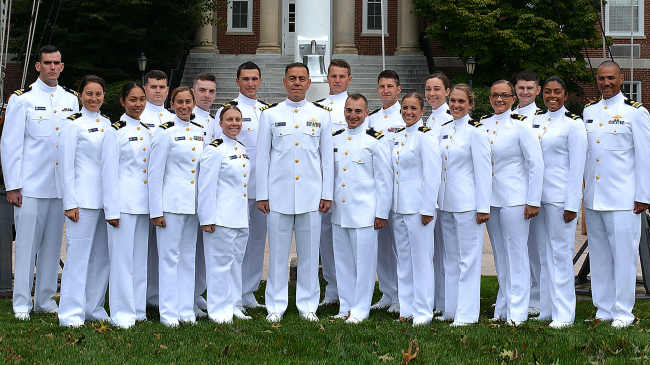 NOAA Corps Basic Officer Training Class (BOTC) 134 poses for their class photo. They all wear the NOAA Corps dress whites.