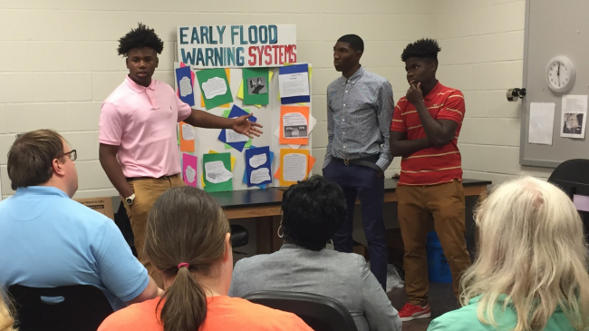 Third place winners of the Resilience MWEE Stewardship Summit at the Gulf Coast Research Laboratory in Ocean Springs, Mississippi. Dominic Blankenship, Nic Steele, and Tommie Ashford are in Mr. Cooper Kimbrell’s Marine Science class at Gautier High School.