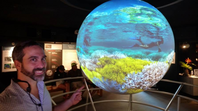 Paulo Maurin of NOAA's Office for Coastal Management gives a Science On a Sphere presentation about coral bleaching at the Bishop Museum in Hawaii. 