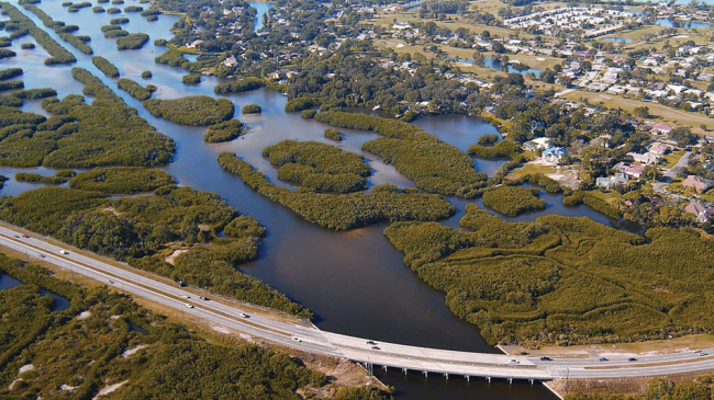 Natural "green barriers" help protect this Florida coastline and infrastructure from severe storms and floods.  