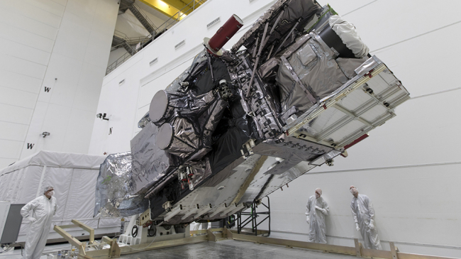 NOAA's GOES-S satellite is rotated to the vertical position after removal of its packing crate at Astrotech Space Operations in Titusville, Florida, so engineers could prepare the satellite for a March 2018 launch. The advance weather satellite is operational now and referred to as GOES-17.