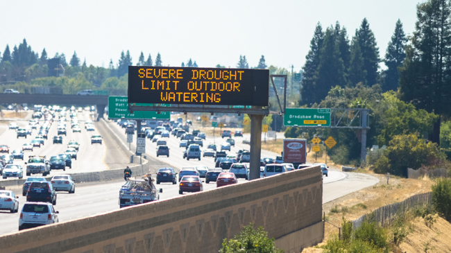 Motorists being warned of severe drought conditions with electronic road signs along U.S. Highway 50 in Sacramento, California. Taken August 5, 2015.