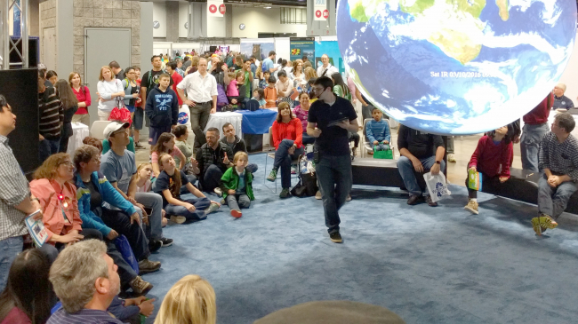 Meteorologist Tom Di Liberto presents on NOAA's Science On a Sphere at the 2016 USA Science and Engineering Festival.