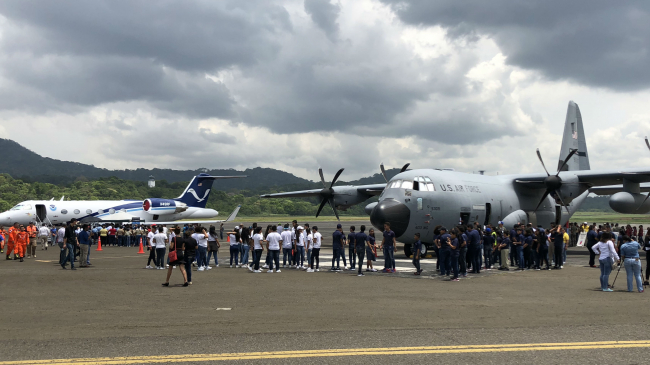 Visitors wait to board NOAA and USAF Reserve hurricane hunter aircraft in Panama City, Panama during the 2018 Caribbean Hurricane Awareness Tour.