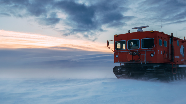 A snowcat vehicle transports Japanese researchers to Dome Fuji, East Antarctica. A high ridge on the plateau is home to the coldest place on Earth today that sees temperatures between -30 and -80 degrees Celsius. 2019 photo.