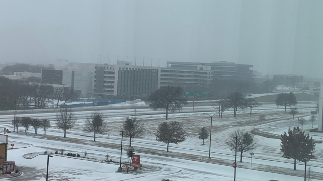 A bird's-eye view of snowy conditions in a business complex south of Dallas-Fort Worth Airport (near HWY 360) in Texas the week of February 14, 2021. A historic winter storm hit most of Texas and brought brutally cold temperatures and crippling ice and snow to the state.