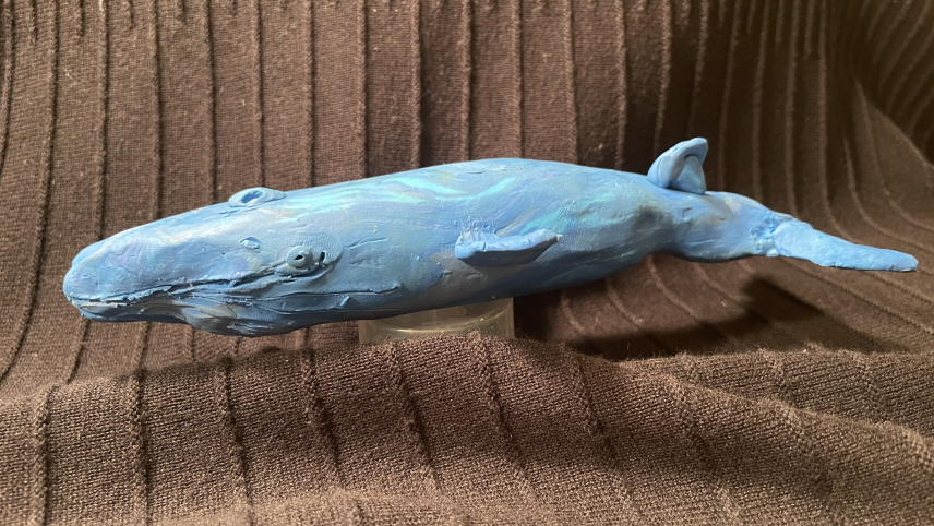 A sculpture of a blue whale.