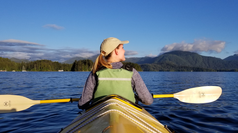 Savannah Miller, a 2018 NOAA Hollings scholar, takes in the scenery while kayaking in the Sitka Sound in Sitka, Alaska, during her summer internship.