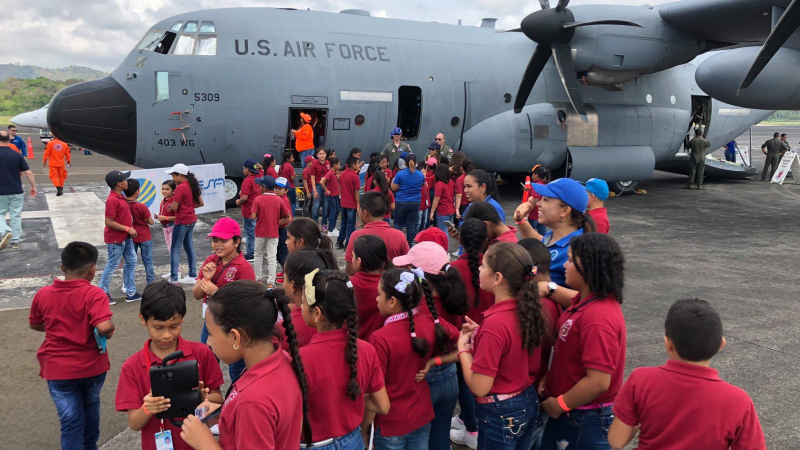 Students visit a USAF Reserve WC-130J during the 2018 Caribbean Hurricane Awareness Tour