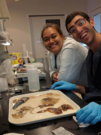 Hollings Scholar Jennifer Wong-Ala and Stanford University graduate student Elan Portner dissecting Longnose Lancetfish stomachs for her project on mapping the spatial distribution of marine debris consumed by organisms in the central Pacific Ocean.