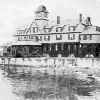 A black and white photo of Woods Hole Laboratory. 