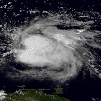 Tropical Storm Erika in the Caribbean Sea. This image was taken by GOES East at 3:15 p.m. EDT on August 27, 2015.