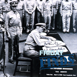 Fleet Adm. Chester W. Nimitz signing surrender document on board the USS MISSOURI (BB-63), at left are Gen. Douglas MacArthur, Adm. William F. Halsey, and R. Adm. Forrest P. Sherman, Deputy Chief of Staff for Adm. Nimitz.